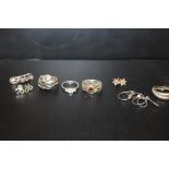 FIVE PAIRS OF SILVER EARRINGS TOGETHER WITH THREE SILVER RINGS