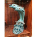 A LARGE RESIN FIGURE OF A DOLPHIN FIGURE