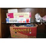 THREE BOXED ALARM SYSTEM ITEMS TOGETHER WITH A SMALL HAND HELD VACUUM AND A BOX OF DOLLS