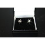 A PAIR OF 9 CARAT GOLD AND SAPPHIRE EARRINGS