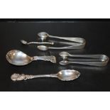 A BAG OF HALLMARKED SILVER SPOONS AND TONGS TO INCLUDE A SCOTTISH EXAMPLE, CADDY SPOON ETC, APPROX