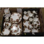 TWO TRAYS OF ROYAL ALBERT OLD COUNTRY ROSES CHINA TO INCLUDE A COFFEE POT, CUPS AND SAUCERS ETC.