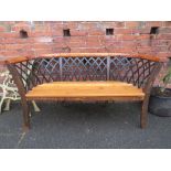 A CURVED WOODEN AND CAST BACK GARDEN BENCH W-160 CM