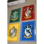 A SET OF FOUR HARRY POTTER METAL SIGNS