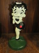 A LARGE CAST IRON BETTY BOOP DOOR STOPPER