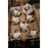 A TRAY OF ROYAL ALBERT OLD COUNTRY ROSES CHINA COMPRISING OF A TEAPOT AND SIX TRIOS