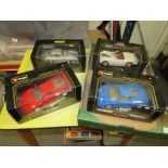 A COLLECTION OF BOXED BURAGO MODEL CARS