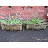 A PAIR OF DECORATIVE OBLONG STONE GARDEN PLANTERS W-55.5 CM