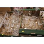 TWO TRAYS OF ASSORTED GLASSWARE TO INCLUDE A VINTAGE FOOTED COMPORT, TUTBURY CRYSTAL ETC