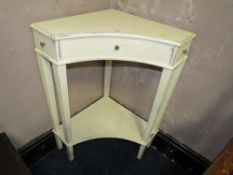 A PAINTED CORNER TWO TIER TABLE WITH TWO DRAWERS W-62 CM
