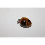 S MORDAN & CO - A NOVELTY PENCIL HOLDER IN THE FORM OF A TIGERS EYE PENDANT WITH INTEGRAL TELESCOPIC