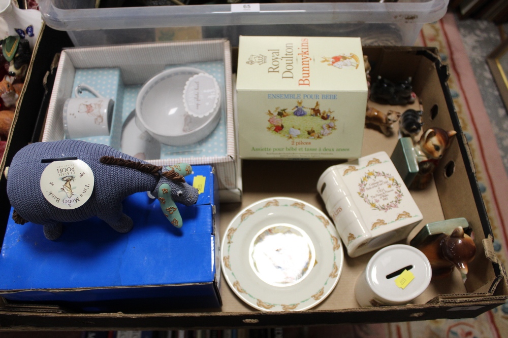 A TRAY OF DOULTON BUNNYKINS ETC TO INCLUDE AN EEYORE MONEY BANK