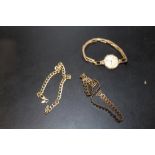 A SMALL BAG OF GOLD PLATED JEWELLERY ETC