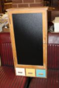 A MODERN WOODEN CHALKBOARD CABINET WITH THREE DRAWERS