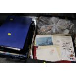 A LARGE QUANTITY OF WORLD STAMPS AND FIRST DAY COVERS BOTH LOOSE AND IN ALBUMS