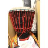 A LARGE TRIBAL STYLE DRUM IN CARRY BAG - H 60 CM