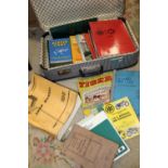 A SUITCASE OF VINTAGE CAR MANUALS ETC.