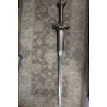 A MODERN DECORATIVE SWORD WITH BRASS EFFECT HANDLE