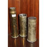 THREE BRASS TRENCH ART VASES - TALLEST 31 CM