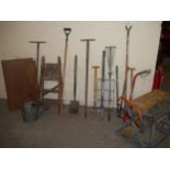 A SELECTION OF GARDEN TOOLS TO INCLUDE A BLACK & DECKER WORKMATE ETC.