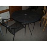 A STEEL GARDEN TABLE AND TWO CHAIRS