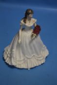 A LARGE ROYAL WORCESTER 'FIGURINE OF THE YEAR 2000'