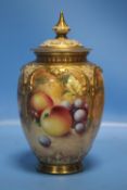 A HAND PAINTED ROYAL WORCESTER LIDDED VASE DECORATED WITH FRUIT SIGNED F. ROBERTS