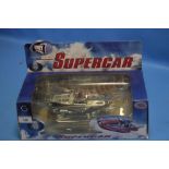 A BOXED DIECAST METAL SUPERCAR