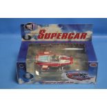 A BOXED DIECAST METAL SUPERCAR