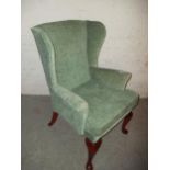 A MODERN QUEEN ANNE STYLE WINGED EASY CHAIR