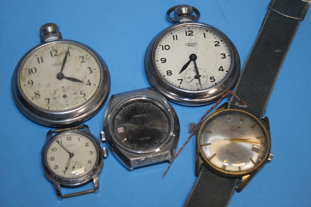 A SMALL TIN OF WATCHES