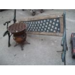 A GARDEN CAST AND WOOD BENCH AND A CAST BBQ A/F