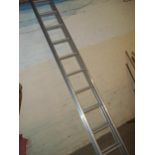 AN ELEVEN RUNG ALUMINIUM DOUBLE LADDER