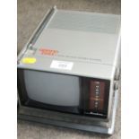 A GRAND PRIX 5" PORTABLE TELEVISION