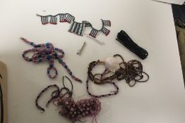 A SMALL COLLECTION OF SOUTH AFRICAN TRIBAL ZULU ART BEADWORK AND SOME MODERN SHELL JEWELLERY