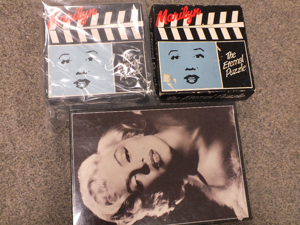 A BOX OF MARILYN MONROE FOLDERS, PHOTOGRAPH ALBUMS AND PUZZLES ETC. - Image 5 of 6