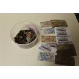 A TUB OF ASSORTED VINTAGE COINAGE AND BANK NOTES ETC.