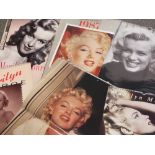 A SELECTION OF MARILYN MONROE RELATED CALANDERS RANGING FROM 80'S TO 90S