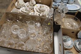 TWO BOXES OF ASSORTED GLASSWARE TO INCLUDE CUT GLASS DECANTERS, FRUIT BOWL DRINKING GLASSES ETC.