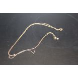 A 9CT GOLD DIAMOND SET NECKLACE