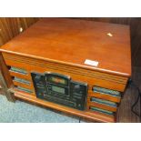 A MODERN COMBINATION RECORD PLAYER CD AND RADIO