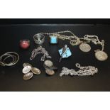 A COLLECTION OF SILVER JEWELLERY TO INCLUDE RINGS, CUFFLINKS, ST CHRISTOPHER PENDANTS ETC.