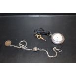 AN ANTIQUE HALLMARKED SILVER FOB WATCH ON A CHAIN