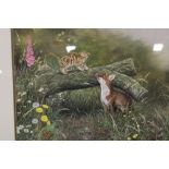 A FRAMED AND GLAZED OIL PAINTING OF A FOX AND A KITTEN SIGNED SUE WARNER LOWER LEFT (SEE VERSO) 32CM