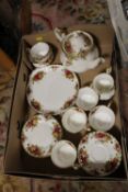 A TRAY OF ROYAL ALBERT OLD COUNTRY ROSES CHINA TO INCLUDE A TEAPOT, CUPS AND SAUCERS ETC.