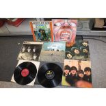 A SMALL QUANTITY OF THE BEATLES LP RECORDS, TOGETHER WITH A KING CRIMSON LP ETC.