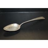 AN ANTIQUE CONTINENTAL WHITE METAL SERVING SPOON