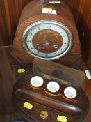 A VINTAGE OAK MANTEL CLOCKS, TOGETHER WITH A WOODEN TRIPLE INKWELL STAND (2)