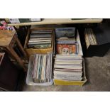 FOUR BOXES OF ASSORTED LP RECORDS TO INCLUDE DON MCLEAN, SANTANA ETC.