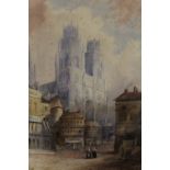 A FRAMED AND GLAZED WATERCOLOUR STREET SCENE WITH CATHEDRAL - H 32 CM W 23 CM